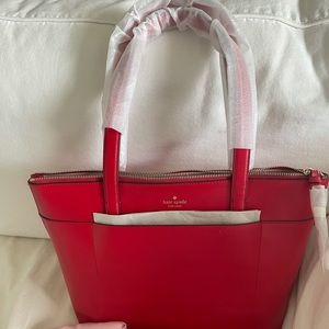 Kate Spade brand new purse w/ matching wallet set.  Never used still has tags!